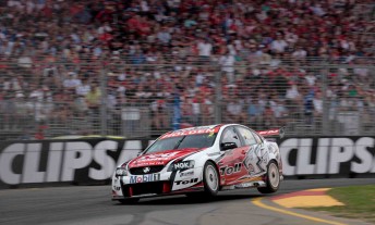 thumb 2010 Clipsal 500 winner Garth Tander blasts through the first chicane in front of a packed grandstand