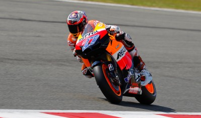 Casey Stoner sets new lap record for pole Casey Stoner sets new lap record for pole