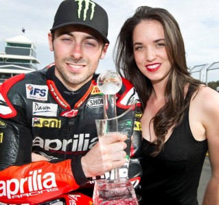 Eugene Laverty wins second World Superbike race at Phillip Island lr WSBK race one winner Eugene Laverty celebrates with partner Pippa Morson 319x299 Eugene Laverty wins second World Superbike race at Phillip Island