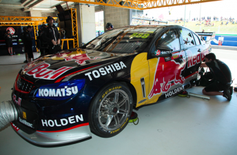 Craig Lowndes' Red Bull Holden receives service in the Bathurst garage