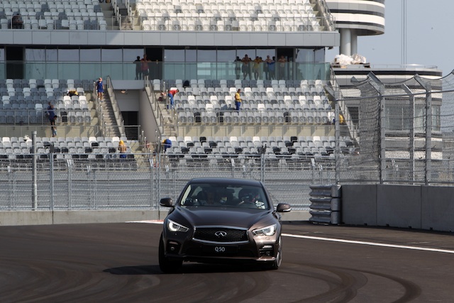 Sebastian Vettel behind the wheel of an Infiniti Q50 at the all new Sochi Autodrom circuit
