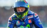 Rossi back on bike in bid for early return