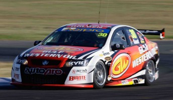 thumb Daniel Gaunt in the Gulf Western Oils Holden Commodore VE at Queensland Raceway
