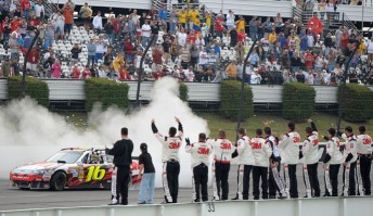 thumb Crew members cheer on Greg Biffle from pit wall after winning at Pocono