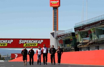 thumb Russell Ingall, James Courtney and Mark Skfie, along with their engineers, walk down Pit Straight at Mount Panorama – home of the Supercheap Auto Bathurst 1000