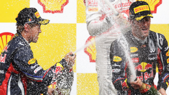 car Mark Webber (right) on the Spa podium last weekend