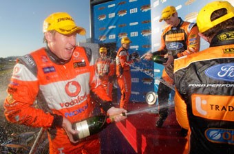 thumb Mark Skaife celebrates on the podium