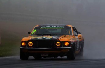 Muscle Cars The Mustang through the spray at Mount Panorama
