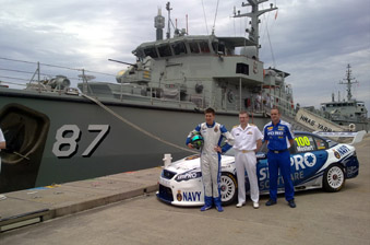 thumb Rising star driver Chaz Mostert, Head Navy Engineering RADM Michael Uzzell and Ford Performance Racing Principal Tim Edwards in front of the V8 Supercar with HMAS Yarra in the background