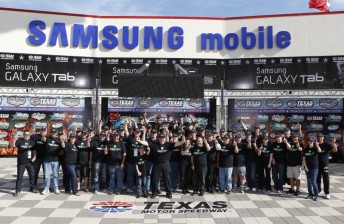thumb Speedcafe.com/BAM Tours guests in victory lane