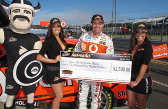 thumb TeamVodafone's Craig Lowndes accepts the Armor All pole award