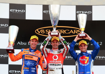 thumb Will Davison (left) and Tim Slade (right) with TeamVodafone's Abu Dhabi dominator Jamie Whincup (centre)