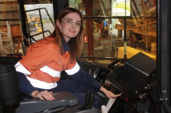 Jodanna Pullen is as competent in a Komatsu machine as she is on the dragway