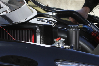The tall VK56DE motor fits snugly underneath the Altima's windscreen