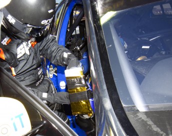 Irwin race crew prepare makeshift heat shield to Lee Holdsworth's foot