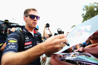 Sebastian Vettel signing autographs for fans at Albert Park