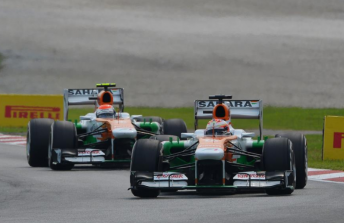 The Force India drivers Adrian Sutil and Paul di Resta were both hit by wheel nut problems in Sepang