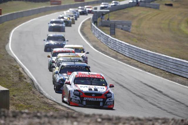 The V8 Supercars make the run into Symmons Plains' iconic hairpin