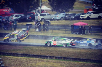 Slade's Holden took flight after clipping the stranded Reynolds