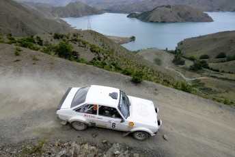 Australians Keith and Mary Anne Callinan in action in their Ford Escort amidst the amazing countryside encountered during the 2010 epay Silver Fern Rally. Pic: Geoff Ridder
