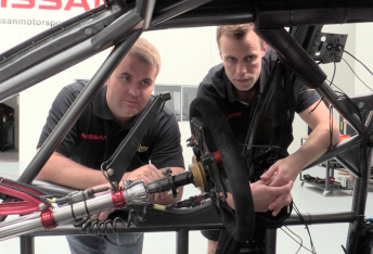 George Commins, pictured with Nissan Motorsport manager Scott Sinclair, started with the team this week