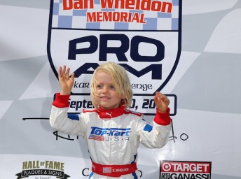 The eldest of the late Dan Wheldon's two boys poses on the podium at the 2014 Pro-Am Karting Challenge in honour of his dad