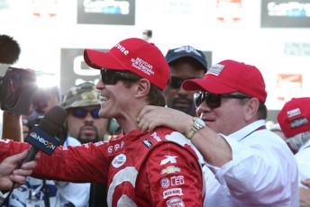 Chip Ganassi embraces Dixon in victory lane