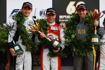 Felix Rosenqvist (centre) celebrates his second Macau GP triumph