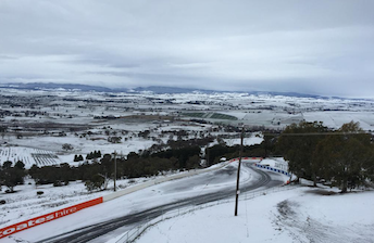 Snow covered the mountain during Schneider's visit with AMG in July