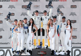 Oliver Gavin and Tommy Milner celebrate GTLM victory