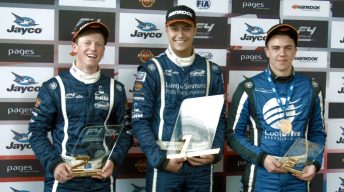 Harry Hayek (centre) celebrates after scoring the Race 3 and Formula 4 round victory