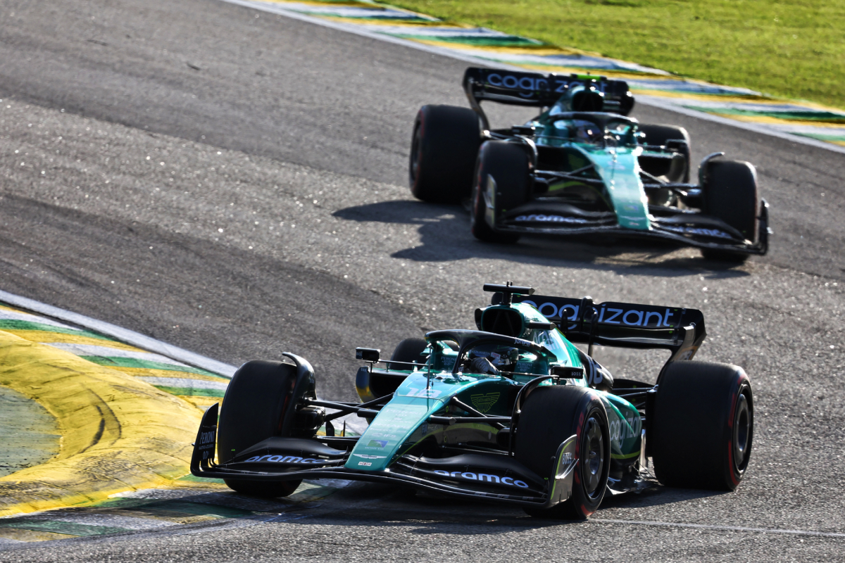 Lance Stroll defends against Sebastian Vettel in Interlagos